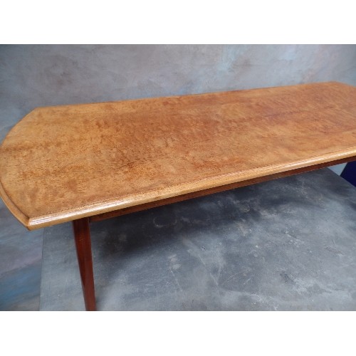 270 - A MID CENTURY BURR WOOD COFFEE TABLE ON SPLAYED AND TAPERED LEGS, CURVED ENDS - 120CM X 43CM X 40CM