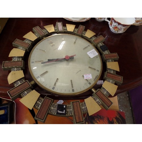 212 - RETRO SUNBURST TEAK & BRASS METAMEC WALL CLOCK. 1 SMALL BRASS SECTION MISSING.