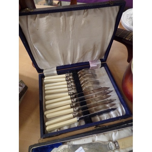 219 - 4 VINTAGE FISH CUTLERY SETS. ORIGINAL BOXES.