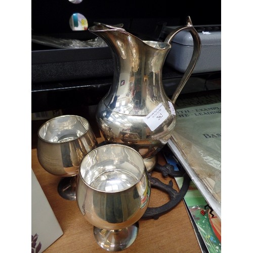 262 - SILVER PLATED JUG AND 2 GOBLETS AND A TRIVET