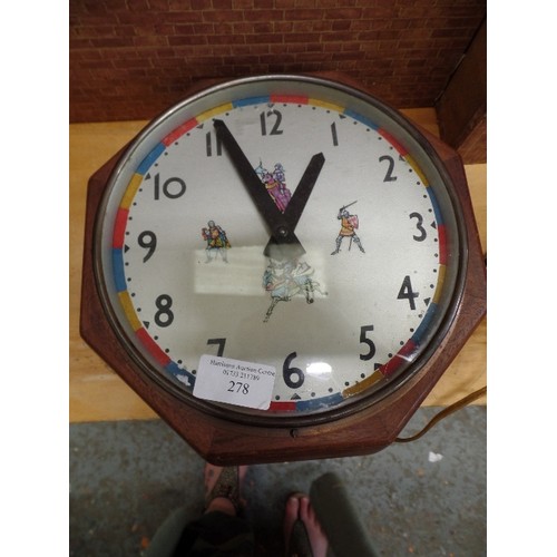 278 - HEAVY VINTAGE WALL CLOCK. 'PUL-SYN-ETIC IMPULSE CLOCK. DECORATED WITH KNIGHTS IN SHINING ARMOUR. HEA... 