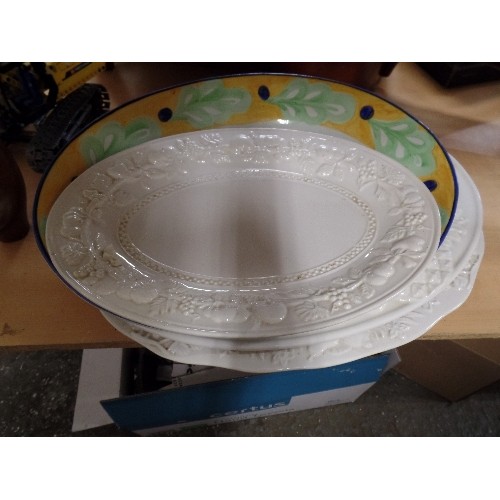 211 - 8 X LARGE OVAL SERVING PLATTERS. 3 ARE CREAM WITH RAISED DETAIL. 1 BRIGHTLY COLOURED. 4 ARE ETCHED S... 