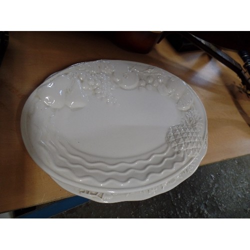 211 - 8 X LARGE OVAL SERVING PLATTERS. 3 ARE CREAM WITH RAISED DETAIL. 1 BRIGHTLY COLOURED. 4 ARE ETCHED S... 