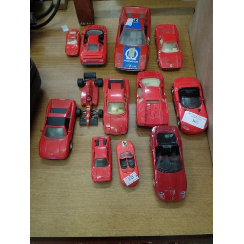 302 - COLLECTION OF 12 MIXED DIE-CAST FERRARI'S. ALL RED.