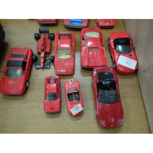 302 - COLLECTION OF 12 MIXED DIE-CAST FERRARI'S. ALL RED.