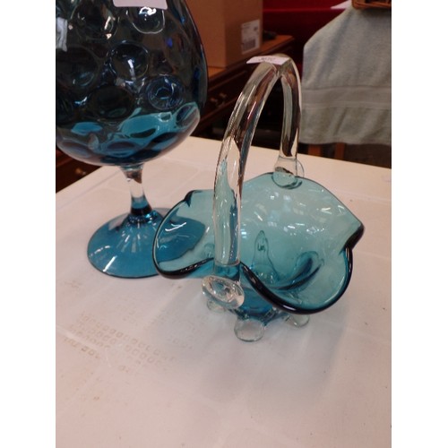 307 - A GLASS BON-BON BASKET, AND A BRANDY BALLOON BUBBLE VASE, BOTH IN THE SAME TEAL BLUE.