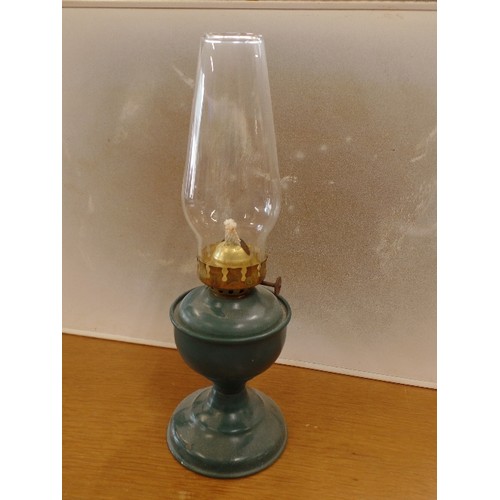 319 - SMALL GREEN OIL LAMP. WITH CHIMNEY.