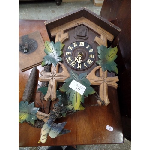 329 - VINTAGE CUCKOO CLOCK.