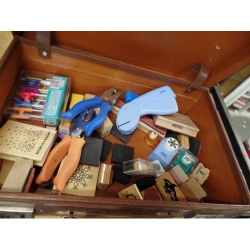 351 - HOBBY AND CRAFT ITEMS CONTAINED IN A SMALL VINTAGE SUITCASE. INCLUDES PRINTING BLOCKS, FISKARS, AND ... 