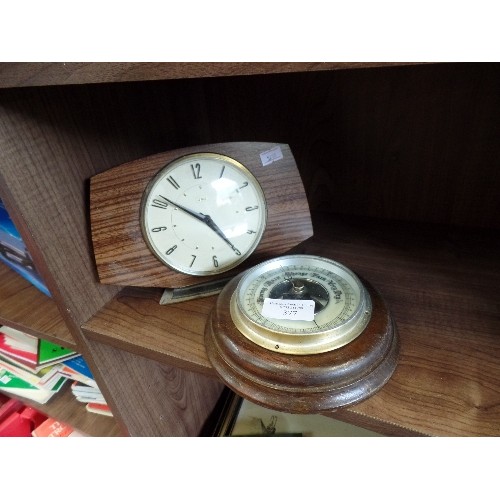 377 - A RETRO METAMEC MANTLE CLOCK, AND A SMALL ROUND BAROMETER.