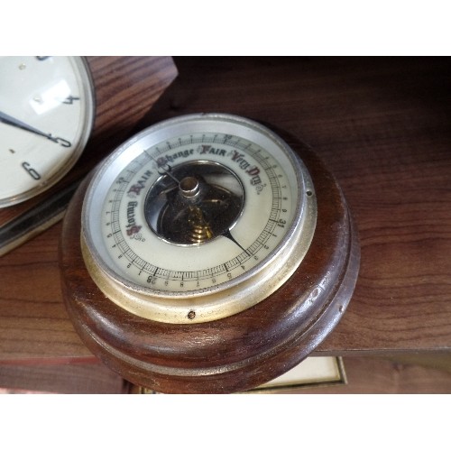 377 - A RETRO METAMEC MANTLE CLOCK, AND A SMALL ROUND BAROMETER.