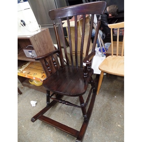 391 - POLISHED DARK WOOD WINDSOR ROCKING CHAIR. REPRO.