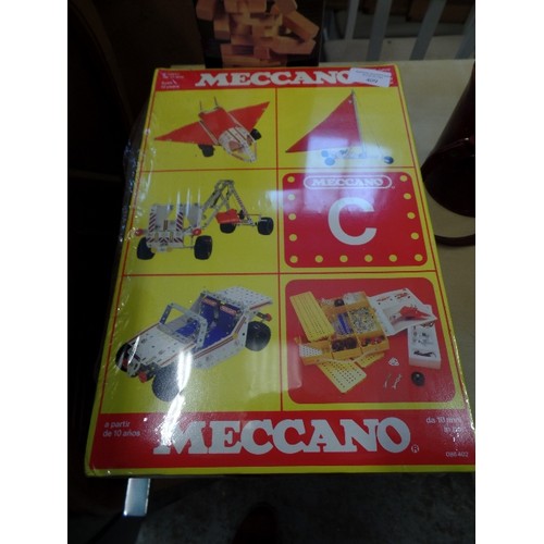 409 - NEW/BOXED MECCANO SET, AND A BOX OF MISCHIEF TOPPLE BLOCKS.