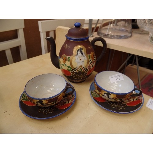 412 - HAND DECORATED ORIENTAL TEA SET. TEAPOT & 2 CUPS/SAUCERS.