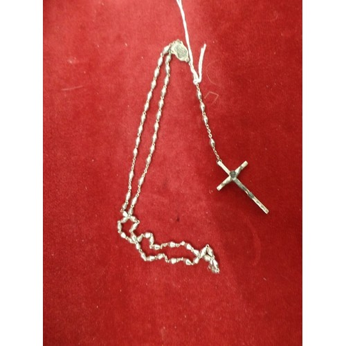 26 - A SILVER METAL ROSARY AND CRUCIFIX