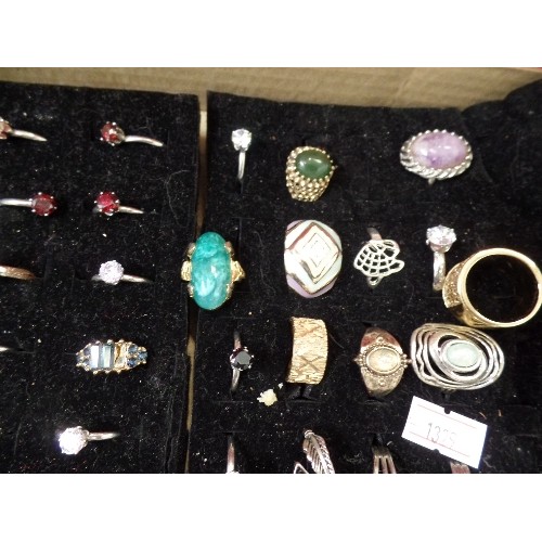 66 - COSTUME JEWELLERY. 55 X DRESS RINGS. MIXED STYLES.  ON BLACK DISPLAY PAD.