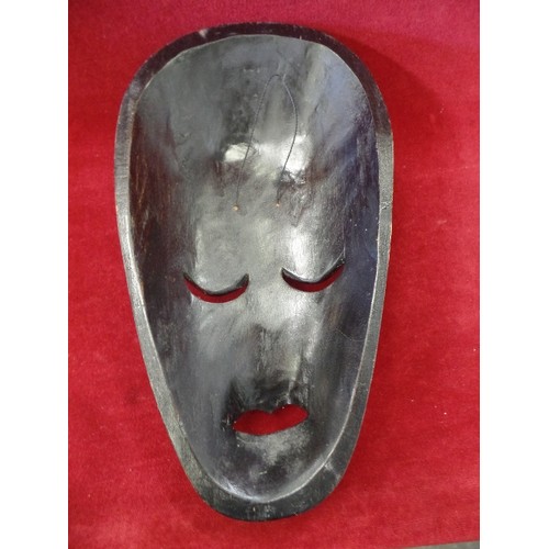 76 - DECORATED AFRICAN WOODEN MASK. LOVELY MUTED COLOURS, RUST, BROWN, BLACK. WALL HUNG. HIGH GLOSS.