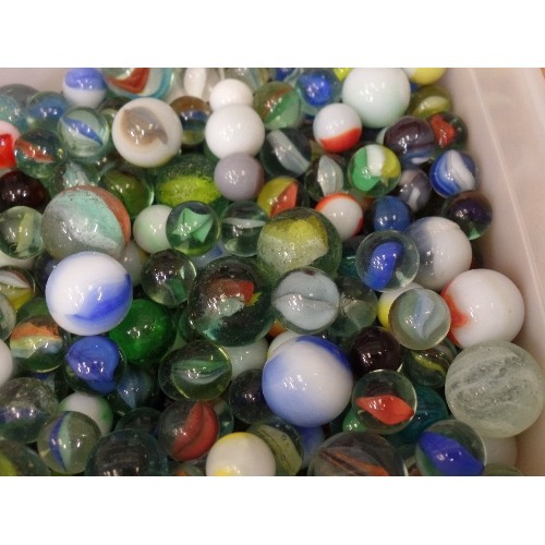 91 - TUB FULL OF GLASS MARBLES.