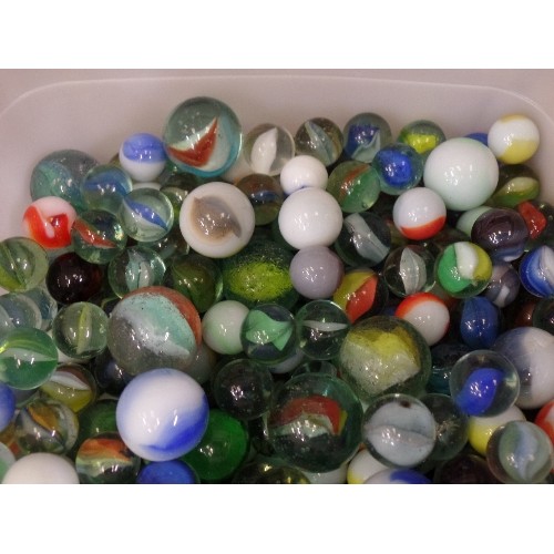 91 - TUB FULL OF GLASS MARBLES.