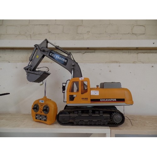 97 - LARGE HOBBY ENGINE 0803 REMOTE CONTROL EXCAVATOR. WITH CHARGER AND CONTROLS. WORKING AT TIME OF LOTT... 