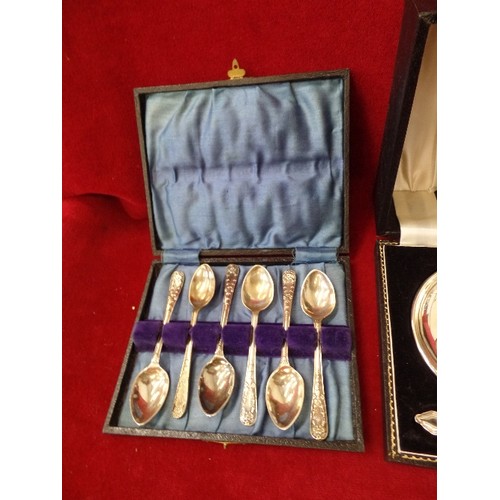 107 - 2 X SILVER-PLATE CHRISTENING EGG-CUP GIFT SETS. ALSO A SET OF TEA-SPOONS. ORIGINAL BOXES.