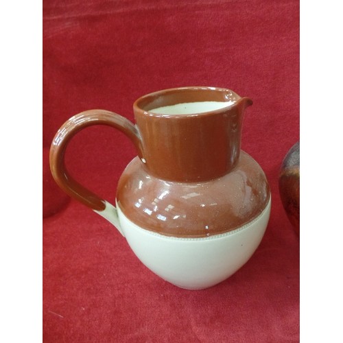 106 - VINTAGE STONEWARE. 1 BROWN & CREAM JUG, AND A PLANTER WITH VOLCANIC STYLE GLAZE.