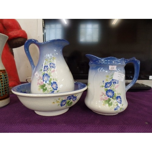 111 - JUG & BOWL SET, AND ANOTHER MATCHING JUG. BLUE FLORAL. REME COLLECTION.