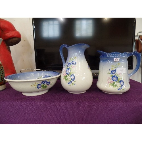 111 - JUG & BOWL SET, AND ANOTHER MATCHING JUG. BLUE FLORAL. REME COLLECTION.