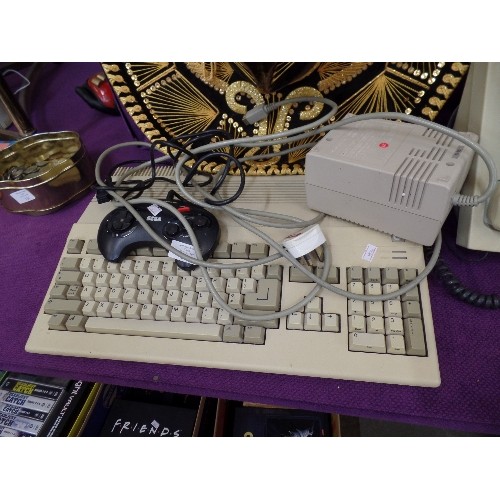 115 - AMIGA COMMODORE A500 KEYBOARD. POPWER SUPPLY ADAPTOR, AND SEGA MEGADRIVE CONTROL PAD.