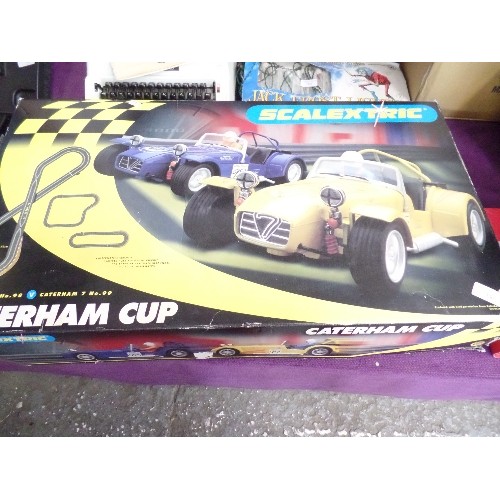 156 - SCALEXTRIC 'CATERHAM CUP' , ALSO TRACK EXTENTION PACK. BOTH IN ORIGINAL BOXES.