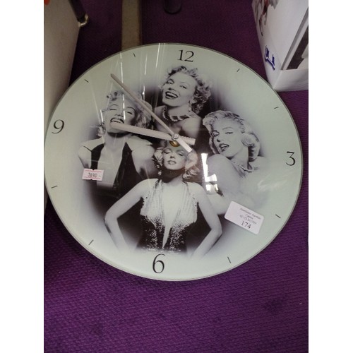 174 - MARILYN MONROE. GLASS WALL CLOCK, MUG, AND COASTER.