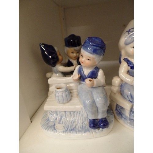 198 - 6 X DELFTS BLAUW-HOLLAND FIGURES. AND A DELFTS BEAKER.