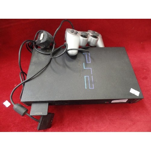 103 - SONY PLAYSTATION 2. WITH CONTROLS.