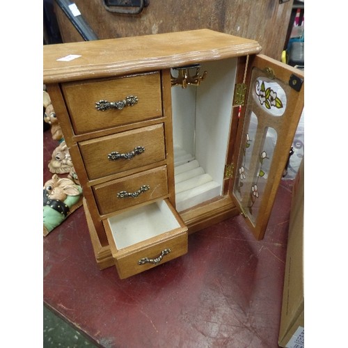 235 - JEWELLERY CABINET. COMPRISING 4 SMALL DRAWERS, AND A NECKLACE CAROUSEL.