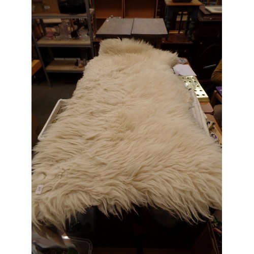 255 - SHEEPSKIN RUG. CREAM.