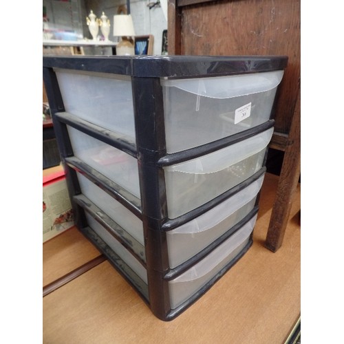 266 - PLASTIC 4 DRAWER STORAGE BLOCK. BLACK/CLEAR.