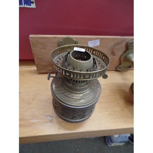 277 - PAIR OF BRASS OIL LAMPS ON WOODEN WALL MOUNT. 1 HAS MILK GLASS GLOBE, 1 MISSING.