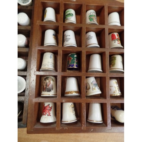 287 - THIMBLE COLLECTION X 55, IN 2 SMALL WALL DISPLAY RACKS.