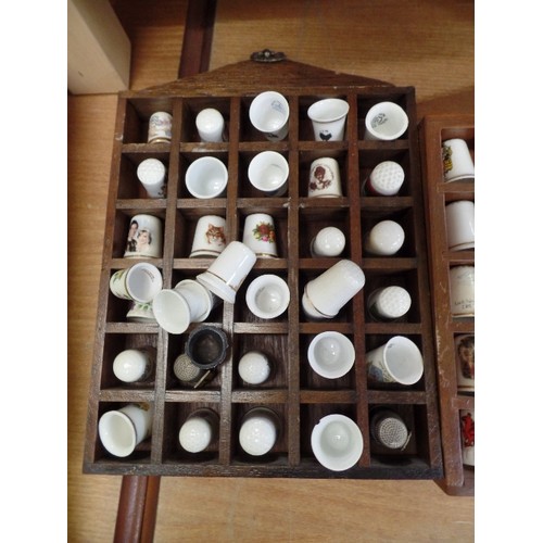 287 - THIMBLE COLLECTION X 55, IN 2 SMALL WALL DISPLAY RACKS.