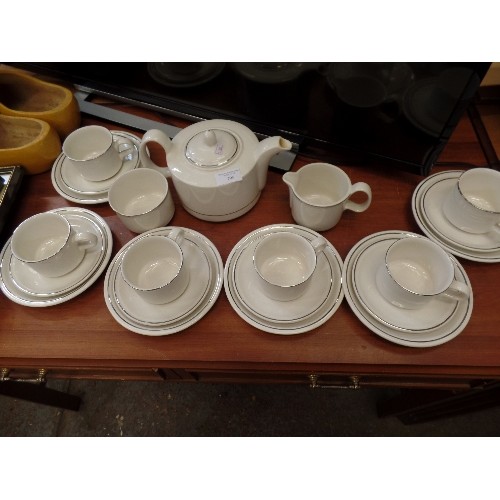 306 - BARRATTS OF STAFFORDSHIRE TEA SERVICE. SIMPLE IVORY AND SILVER. TEAPOT, SUGAR, MILK, AND 6 DUOS.