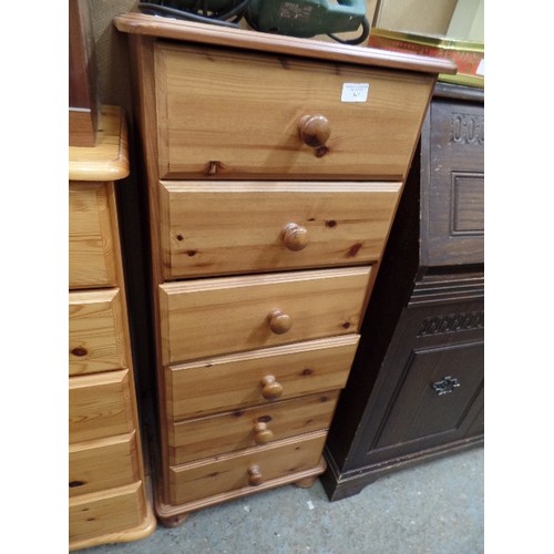 317 - NARROW 6 DRAWER PINE CHEST. 45CM W. 1 DRAWER FRONT NEEDS RE-FIXING.