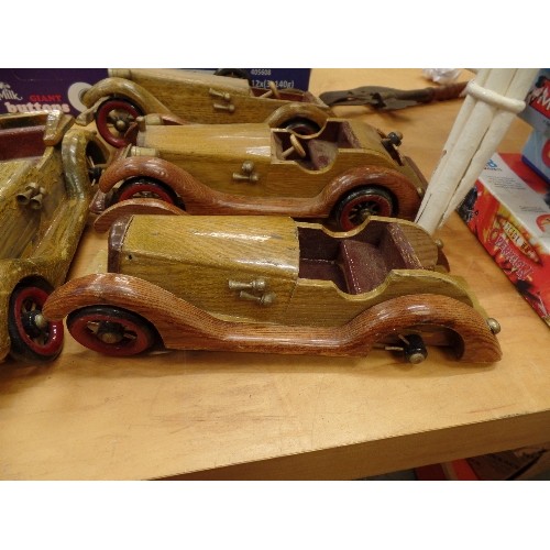 282 - 5 X HAND-MADE WOODEN CARS. VINTAGE STYLE. ALL APPROX 35CM LONG. SOME WHEEL-SPOKE REPAIR NEEDED.