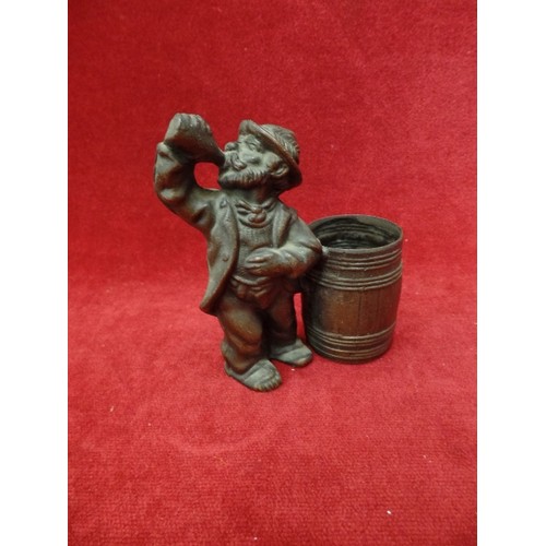 18 - BRONZE FIGURE OF MAN DRINKING NEXT TO BARREL