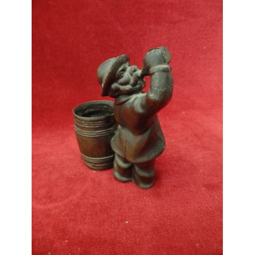 18 - BRONZE FIGURE OF MAN DRINKING NEXT TO BARREL