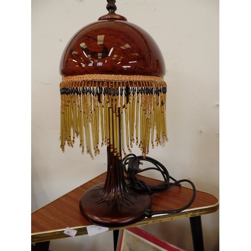 92 - ATTRACTIVE TABLE LAMP. BROWN GLASS SHADE WITH BEADED FRINGE.