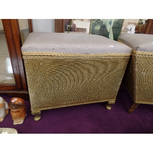 122 - 2 SMALL VINTAGE MATCHING OTTOMANS. GOLD-PAINTED WITH PALE GREY UPHOLSTERED SEATS. 1 IS STRAIGHT-SIDE... 