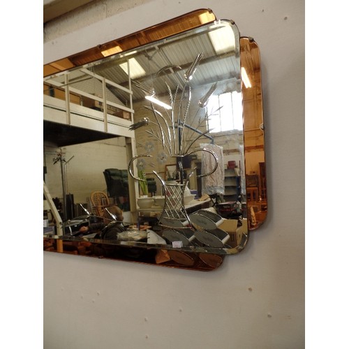 136 - RETRO FRAMELESS WALL MIRROR, WITH ETCHED FLORAL DESIGN, AND COPPERED GLASS EDGE.