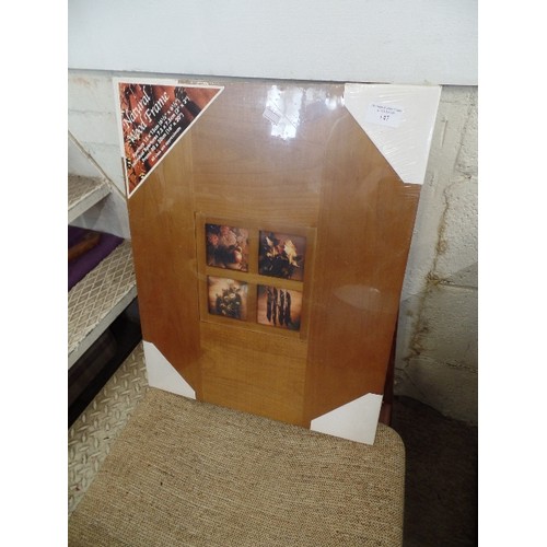 147 - NEW/PACKAGED CONTEMPORARY WOOD PHOTO FRAME WITH 4 SMALL SQUARE APERTURES.