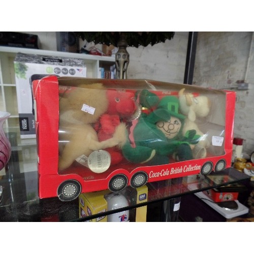 195 - COCA-COLA BRITISH COLLECTION. NEW/BOXED SOFT TOY CHARACTERS IN A BUS SHAPED BOX.