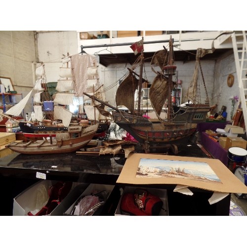 238 - A VINTAGE HAND-MADE WOODEN PIRATE SHIP/GALLEON, A SAILING SHIP AND A SMALLER SHIP. ON STANDS. ALSO A... 